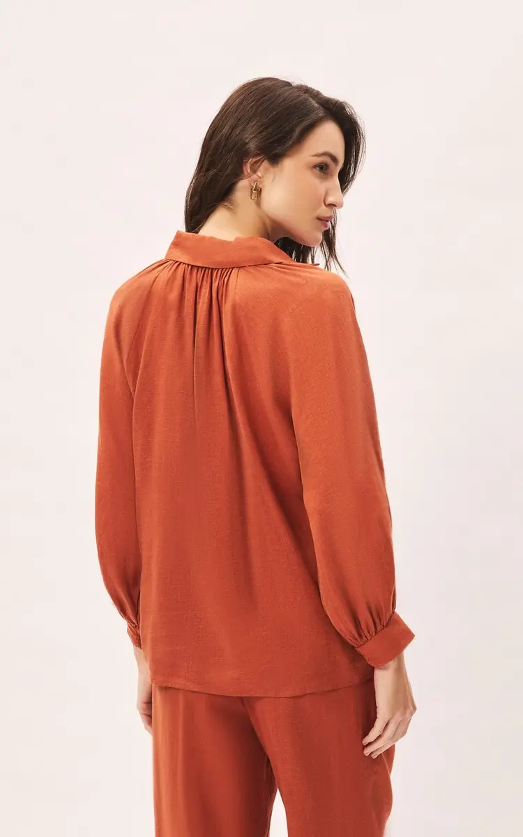 CAMISA RAGLAN COM FRANZIDO