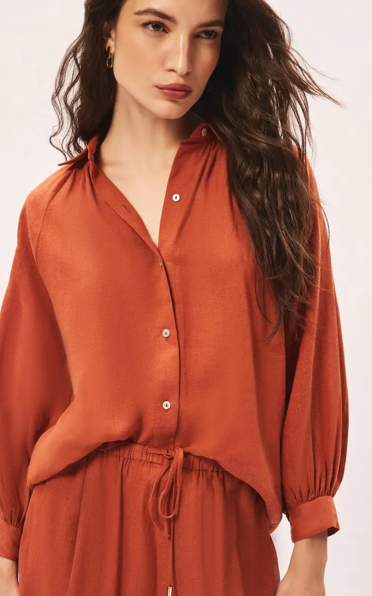 CAMISA RAGLAN COM FRANZIDO